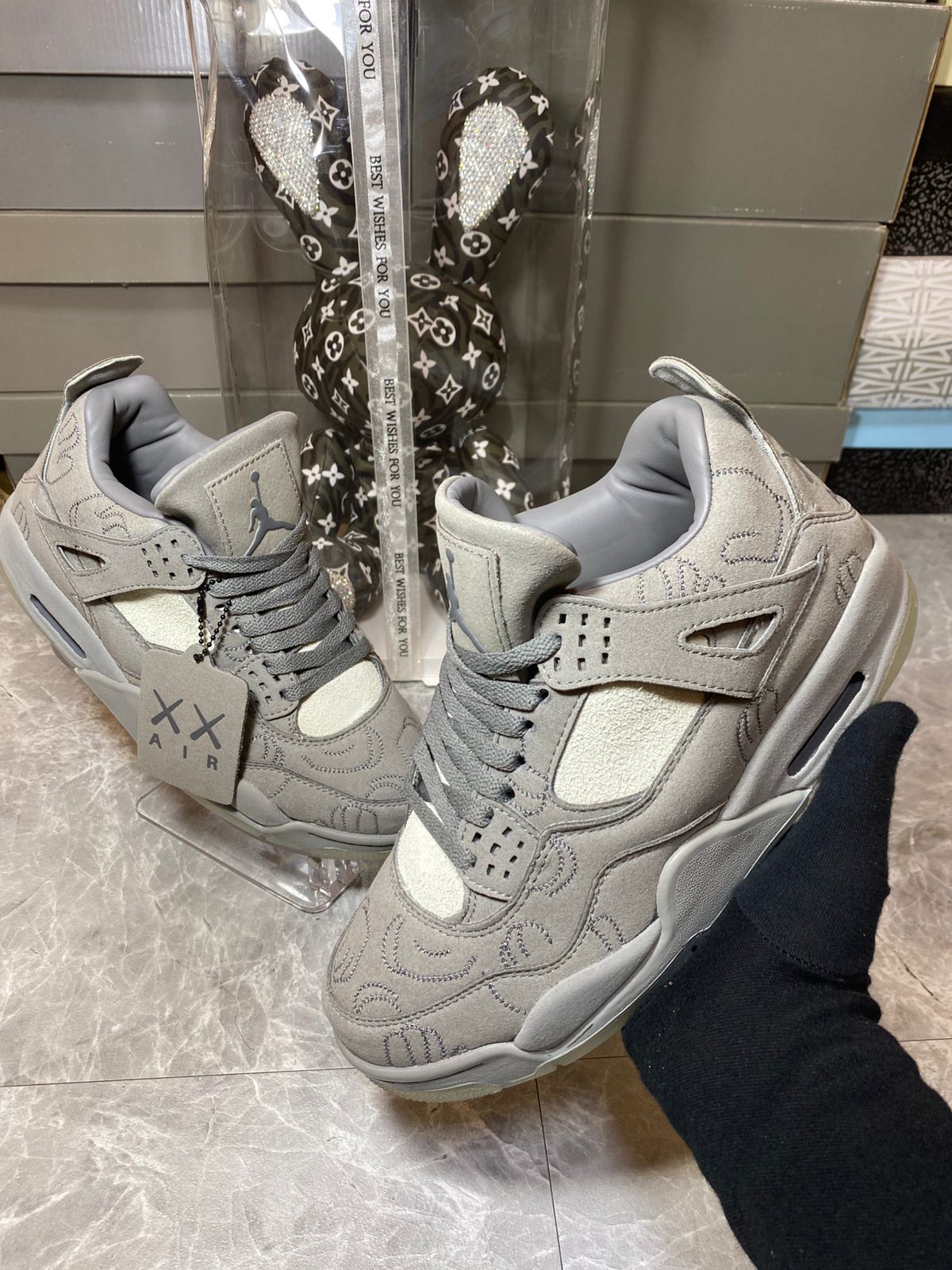 KAWS x Air Jordan 4 Retro Cool Grey & White 🐘